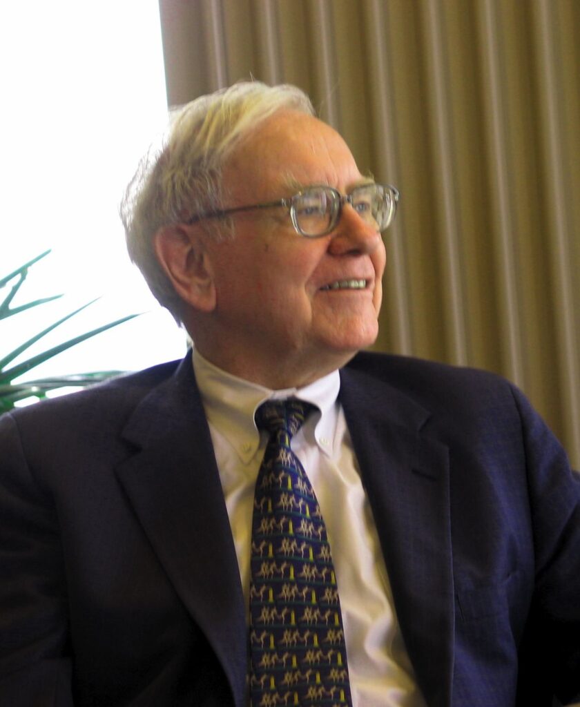 A photo of Warren Buffett in suit and tie.